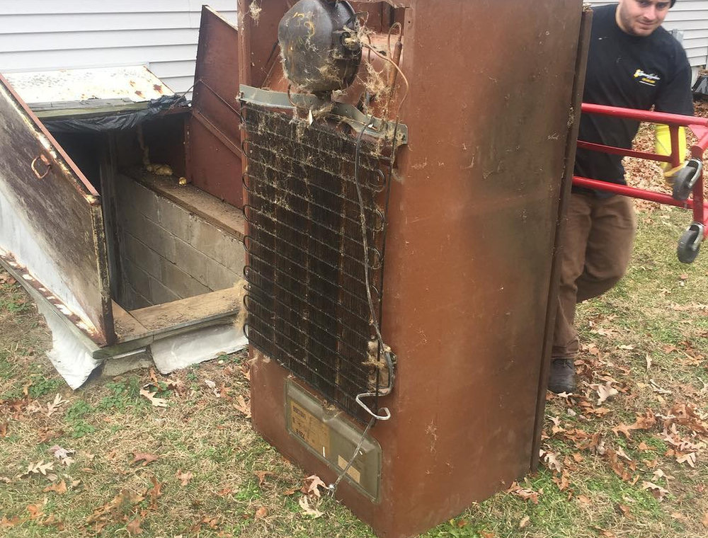 Removing a refrigerator from a basement