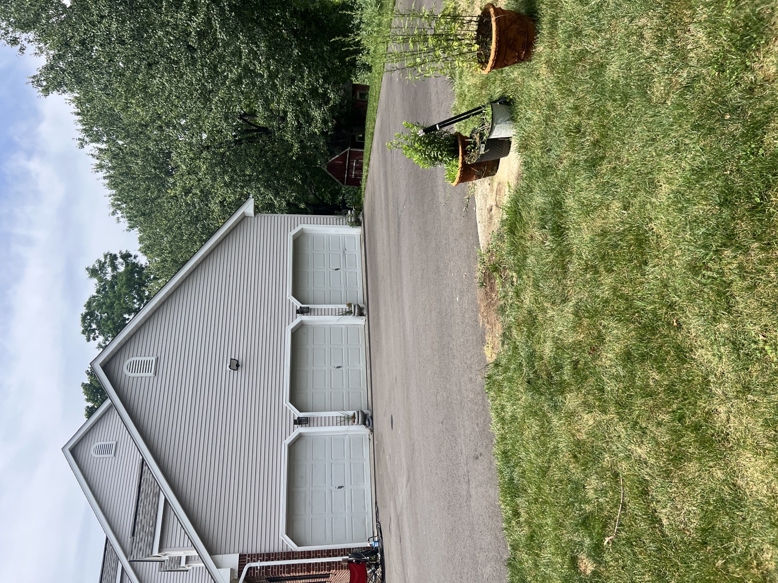 Basketball hoop area after removal — clean and clear
